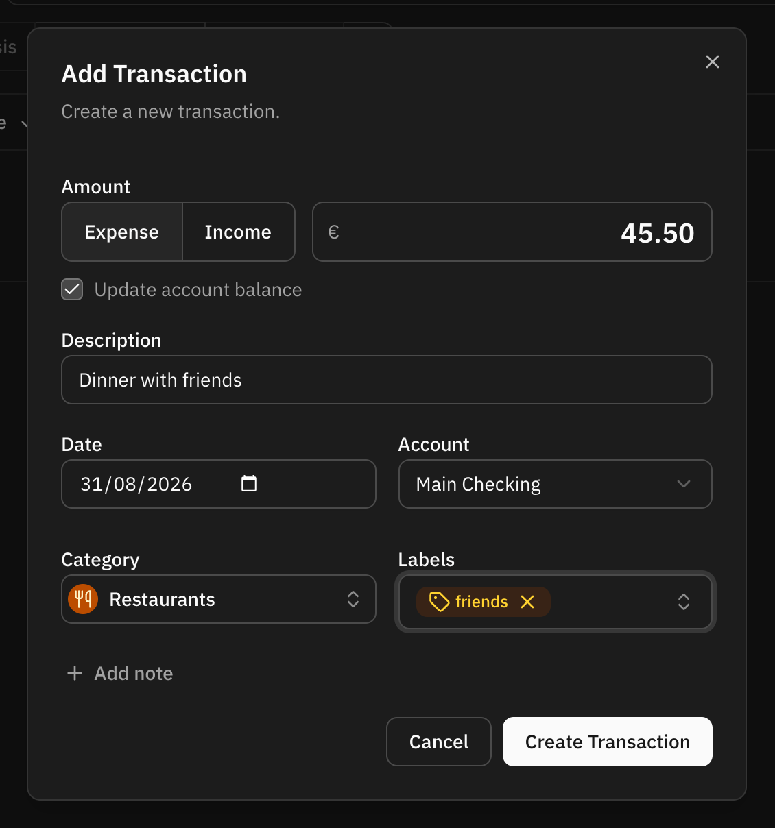 The create transaction dialog, with the expense and income toggle next to the amount at the top, the description, date and account fields below, and the category and labels pickers under them